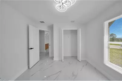 227 Narcissus Ave S, Lehigh Acres, FL 33974 - Photo 12