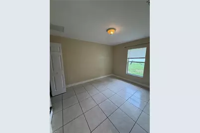 409 Candlewick Cir E, Lehigh Acres, FL 33936 - Photo 6