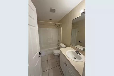 409 Candlewick Cir E, Lehigh Acres, FL 33936 - Photo 8