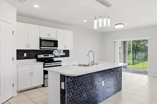 10601 Crossback Ln, Lehigh Acres, FL 33936 - Photo 6