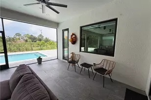 910 Venice Ave N, Lehigh Acres, FL 33971 - Photo 16