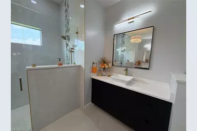 910 Venice Ave N, Lehigh Acres, FL 33971 - Photo 24