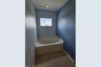 2412 King Ave N, Lehigh Acres, FL 33971 - Photo 14