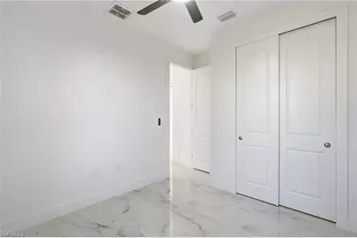 1134 Holmes Ave S, Lehigh Acres, FL 33974 - Photo 24
