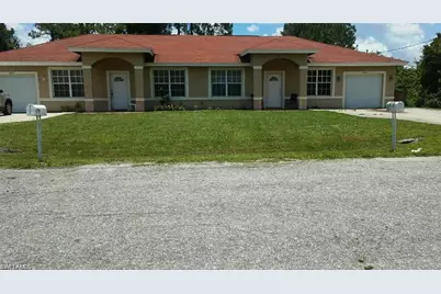 5216 27th St SW, Lehigh Acres, FL 33973 - Photo 1