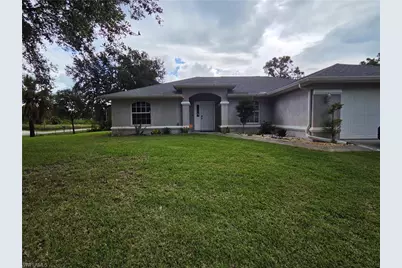1025 Iris St E, Lehigh Acres, FL 33974 - Photo 2