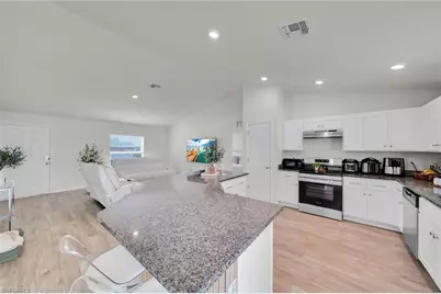 1219 NW 15th Ter, Cape Coral, FL 33993 - Photo 4