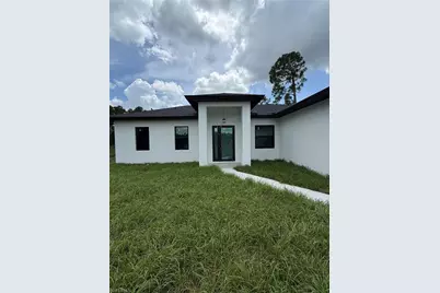 1052 Grove St E, Lehigh Acres, FL 33974 - Photo 2
