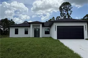 1052 Grove St E, Lehigh Acres, FL 33974 - Photo 1