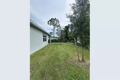 911 Unice Ave N, Lehigh Acres, FL 33971 - Photo 6