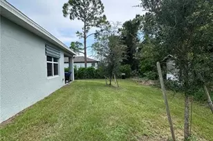 911 Unice Ave N, Lehigh Acres, FL 33971 - Photo 6