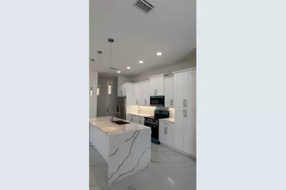 1447 SW 1st St, Cape Coral, FL 33991 - Photo 2
