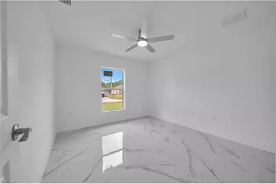 1025 Pilgrim St E, Lehigh Acres, FL 33974 - Photo 22