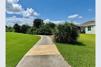 9291 Aqua Overlook Ct, Lehigh Acres, FL 33936 - Photo 18