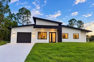 712 Bumby St E, Lehigh Acres, FL 33974 - Photo 1