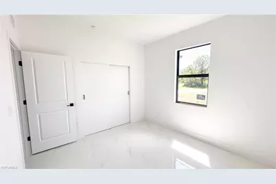 704 Asher St E, Lehigh Acres, FL 33974 - Photo 14