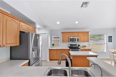 424 La Perouse St, Lehigh Acres, FL 33974 - Photo 6