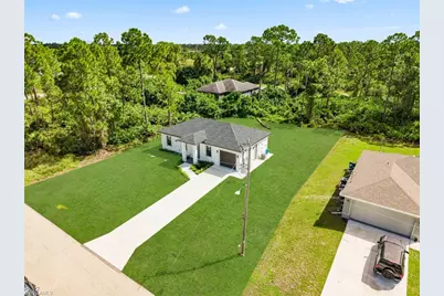 1005 SW Brenton Ave, Lehigh Acres, FL 33974 - Photo 28