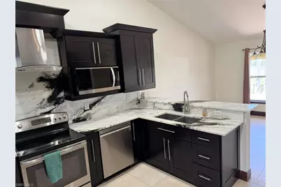 702 Calvin Ave, Lehigh Acres, FL 33972 - Photo 12