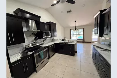 702 Calvin Ave, Lehigh Acres, FL 33972 - Photo 8