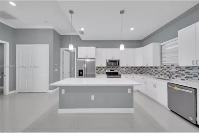 105 E 15th St, Lehigh Acres, FL 33972 - Photo 1
