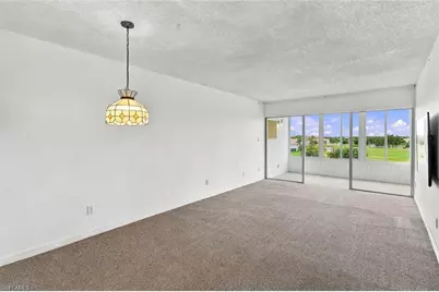 1580 Pine Valley Dr #405, Fort Myers, FL 33907 - Photo 10