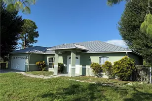 372 Carrillon Ave S, Lehigh Acres, FL 33974 - Photo 1