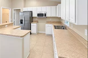 1023 Maddock St E, Lehigh Acres, FL 33974 - Photo 4