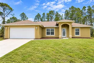 1023 Maddock St E, Lehigh Acres, FL 33974 - Photo 1