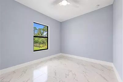 1052 Barnett St E, Lehigh Acres, FL 33974 - Photo 20