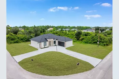 415 Chamonix Ave S, Lehigh Acres, FL 33974 - Photo 2