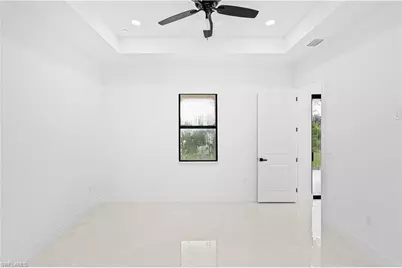 415 Chamonix Ave S, Lehigh Acres, FL 33974 - Photo 32