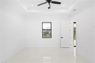 415 Chamonix Ave S, Lehigh Acres, FL 33974 - Photo 32