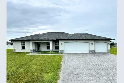 1125 NW 2nd Pl, Cape Coral, FL 33993 - Photo 1