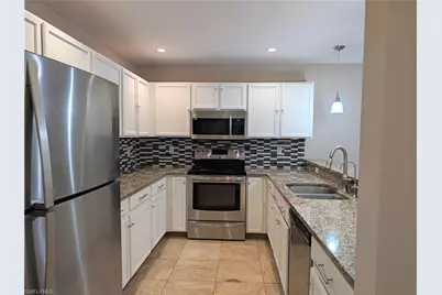 723 Homer Ave S, Lehigh Acres, FL 33973 - Photo 4