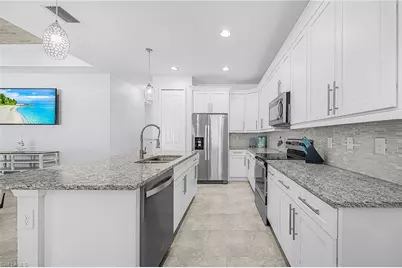 1703 SW 12th Ter, Cape Coral, FL 33991 - Photo 18