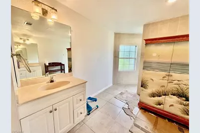 902 Susan Ave N, Lehigh Acres, FL 33971 - Photo 16