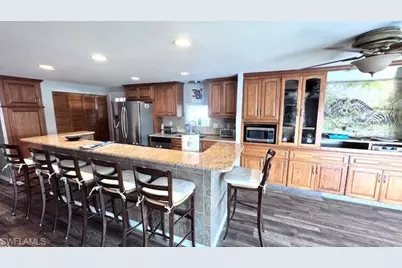 5545 Sir Walter Way, North Fort Myers, FL 33917 - Photo 6