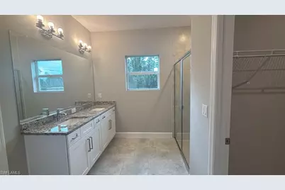 279 Woodburn Dr, Lehigh Acres, FL 33972 - Photo 12
