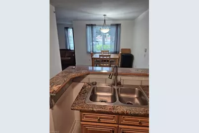 1220 Reserve Way #107, Naples, FL 34105 - Photo 1