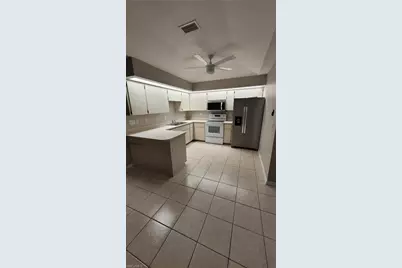 1209 SE 23rd Pl, Cape Coral, FL 33990 - Photo 4