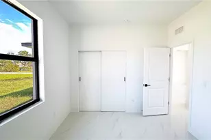 712 Asher St E, Lehigh Acres, FL 33974 - Photo 6
