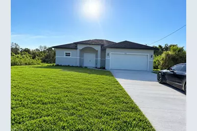 1247 Cavalier Cir, Lehigh Acres, FL 33974 - Photo 2