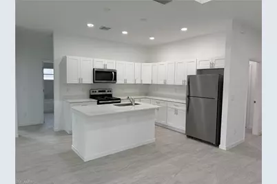 1247 Cavalier Cir, Lehigh Acres, FL 33974 - Photo 4