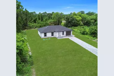 382 McArthur Blvd, Lehigh Acres, FL 33974 - Photo 1