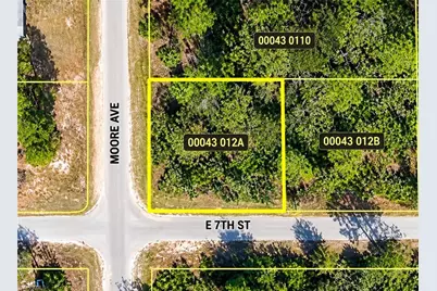 E 7th St, Lehigh Acres, FL 33972 - Photo 1