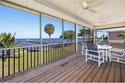 8560 Ebbtide Way, Bokeelia, FL 33922 - Photo 16