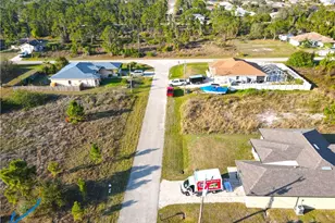 1038 Bassinger Ave S, Lehigh Acres, FL 33974 - Photo 2