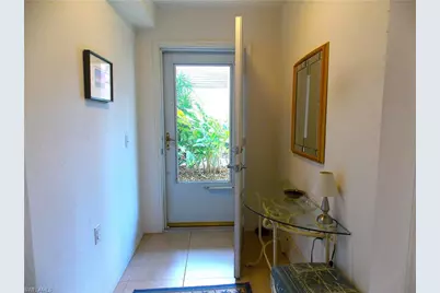 15475 Cedarwood Ln #104, Naples, FL 34110 - Photo 2