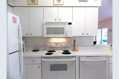 15475 Cedarwood Ln #104, Naples, FL 34110 - Photo 12